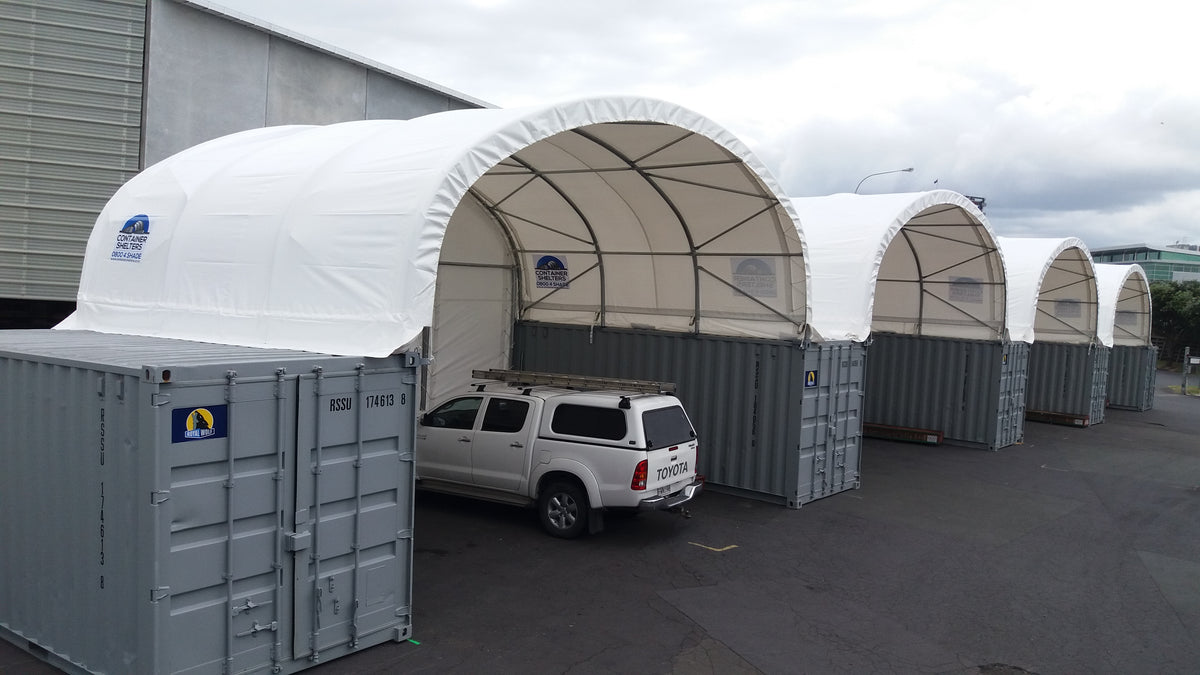 Two 8m x 20ft container shelters side by side at a West Auckland building supplies yard