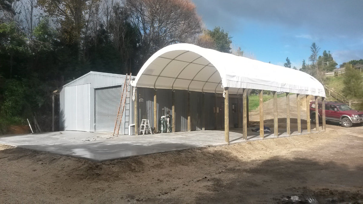 6m x 40ft shelter mounted on timber posts at a Northland manufacturing site