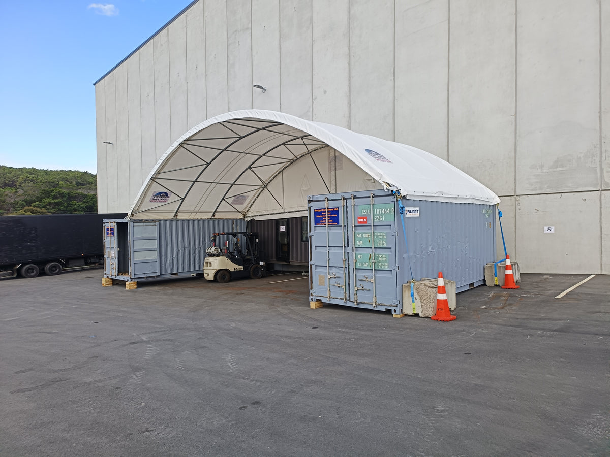 Container shelter with an inside to outside mount at an Auckland film studio