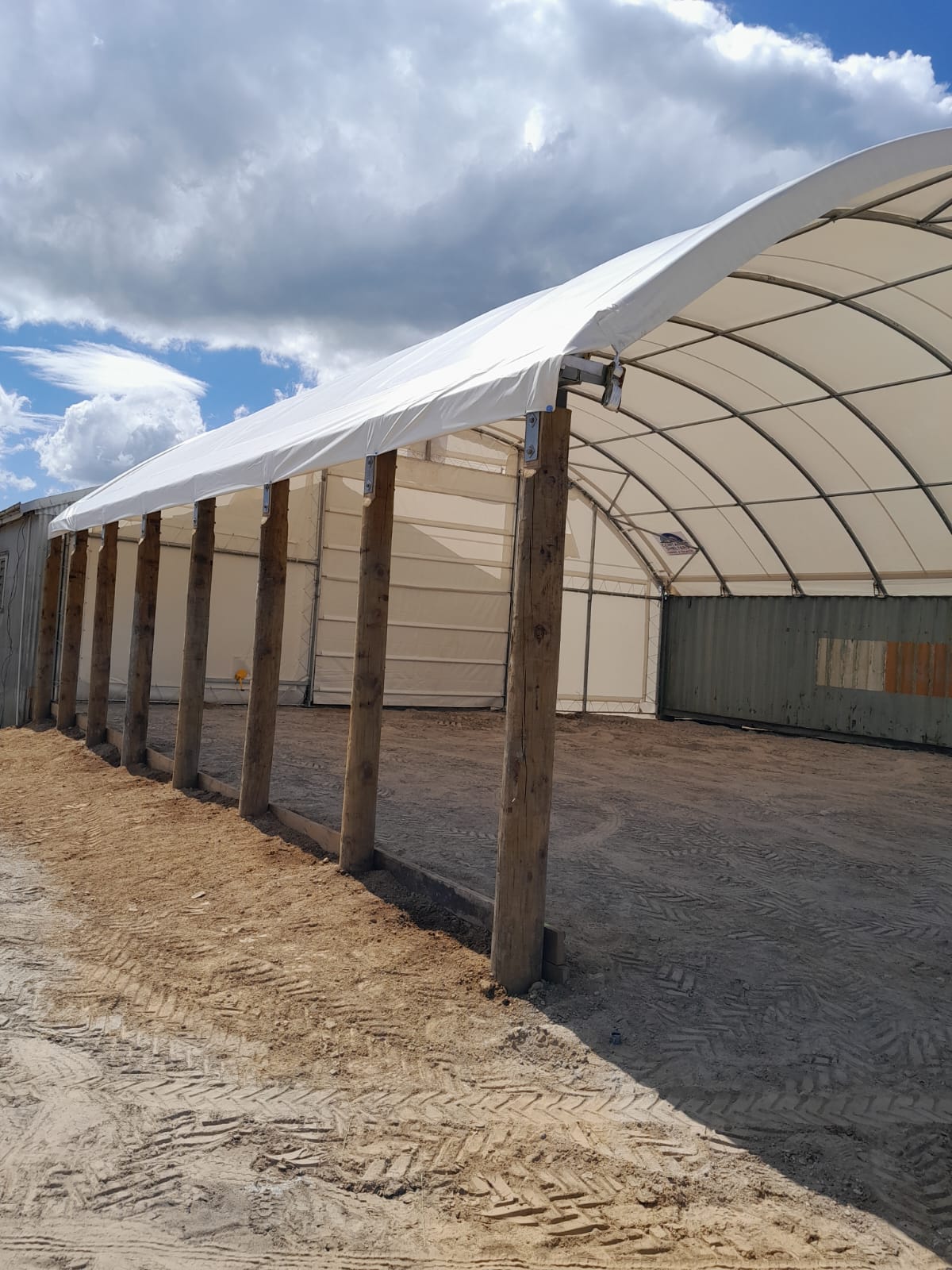 Container shelter on a combined post and container mount, Hamilton